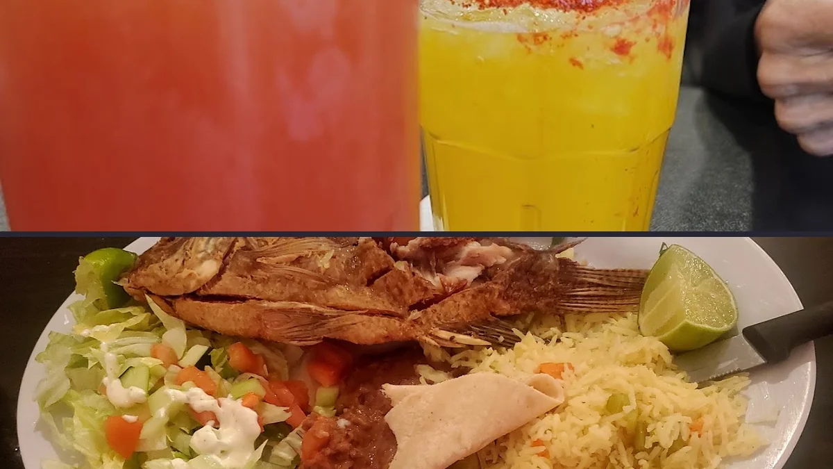 Margaritas beside small plates in an art-filled space.