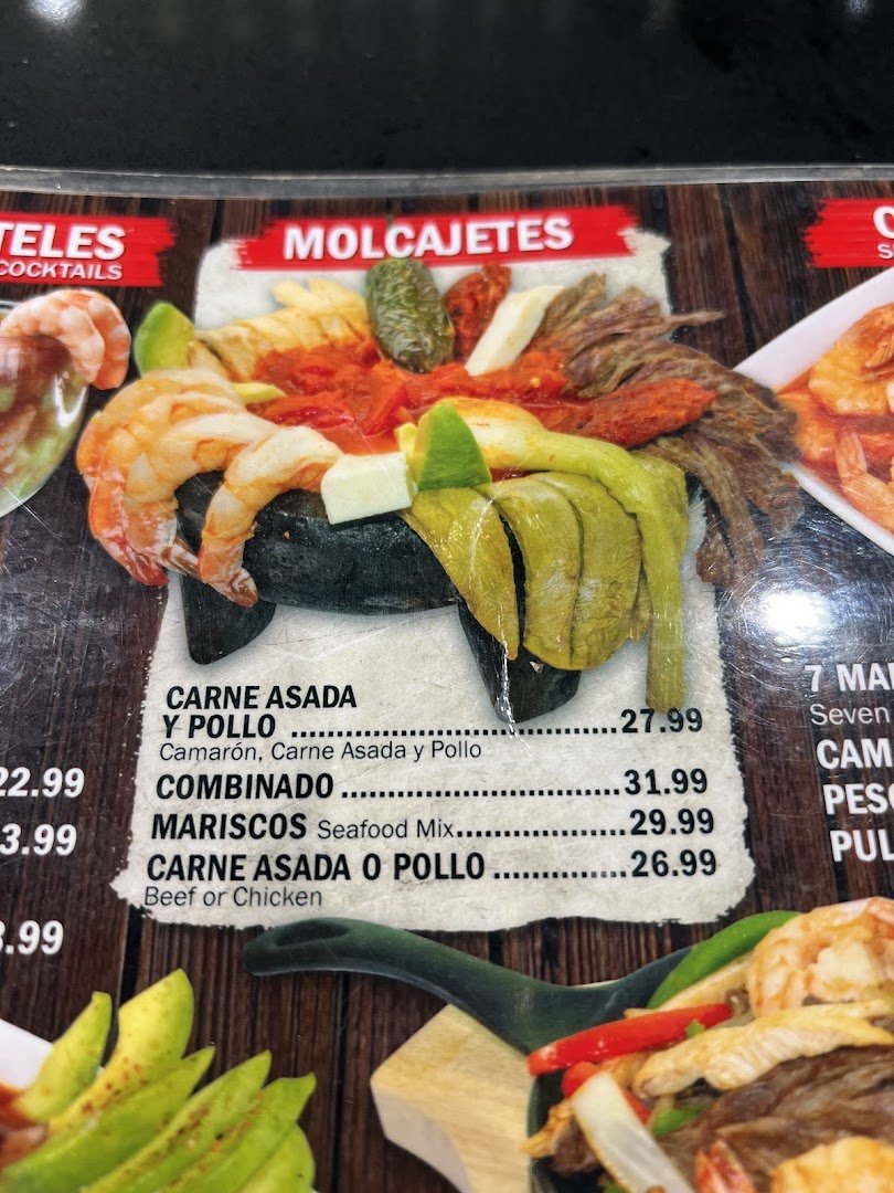 Colorful Mexican dishes on a casual restaurant table.
